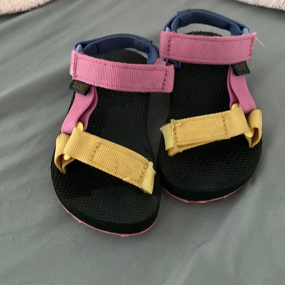 Teva size 9 Velcro sandals. Pink, yellow, and purple.